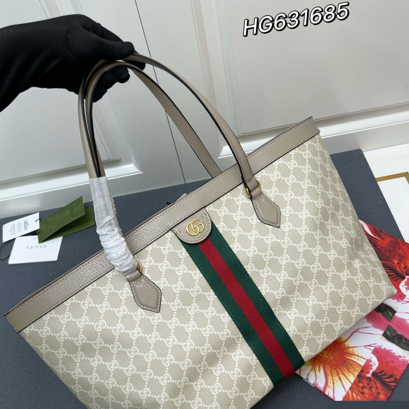 G*u*i shopping bags